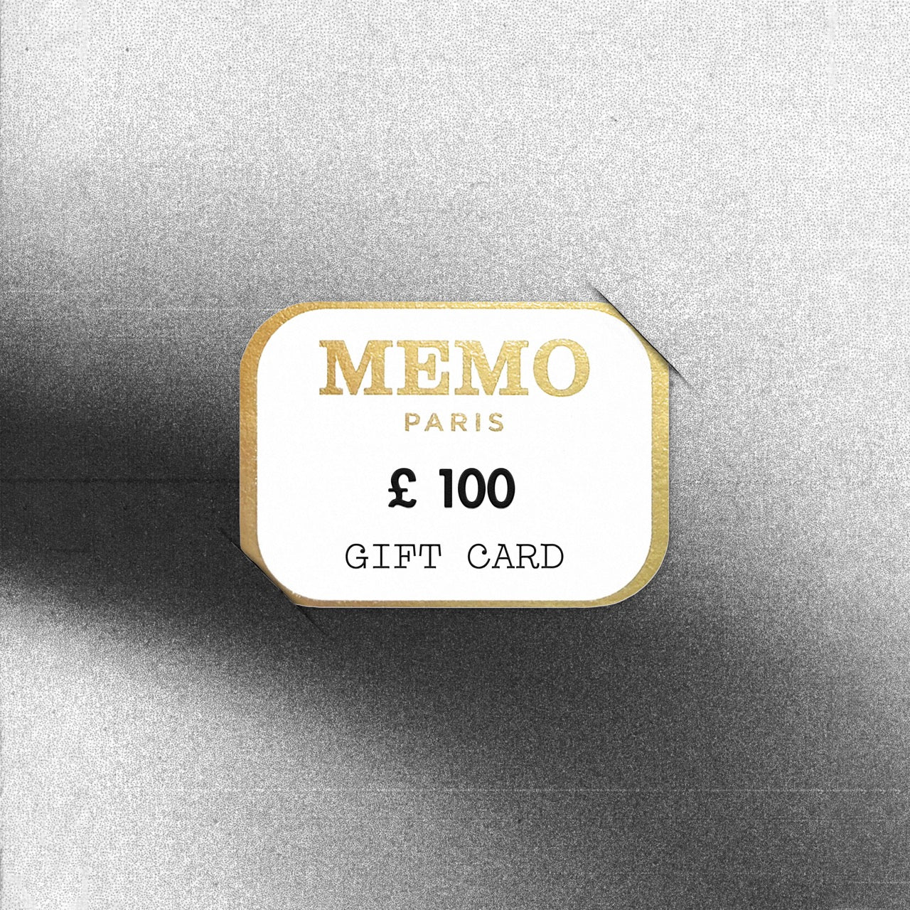 A white and gold memo paris gift card with a 100 dollar denomination celebrating dream destinations — vue alternative