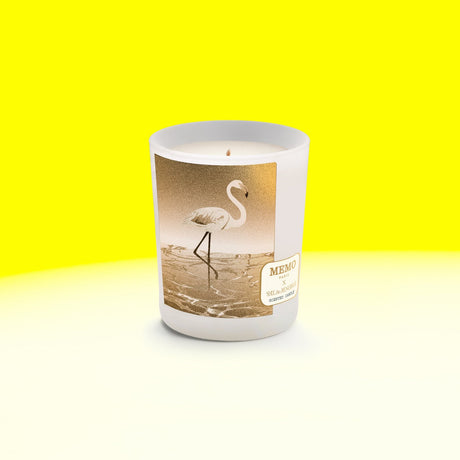 White frosted glass candle jar with gold foil flamingo and memo paris label for sal de menorca scent